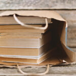 paper bag with books - deposit photos